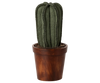 The Maileg Flower Pot With Cactus, Miniature features a green fabric cactus with ridged sections standing upright in a small flower pot against a striped background.