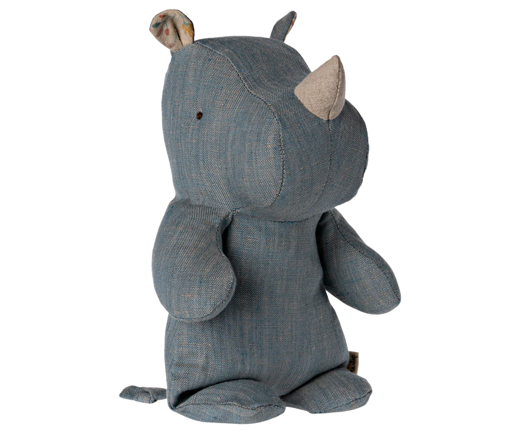 The Maileg Small Rhino - Blue Sand is a soft, blue-grey stuffed toy with a large horn, small ears, stitched details, and an upright pose from the Safari friends collection.