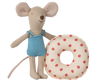 The Maileg Beach Mouse With Float, Little Sister - Red Dot features a smiling mouse in a blue swimsuit with large ears and a long tail, standing next to a soft, round, red polka dot float—perfect for playful summer fun.