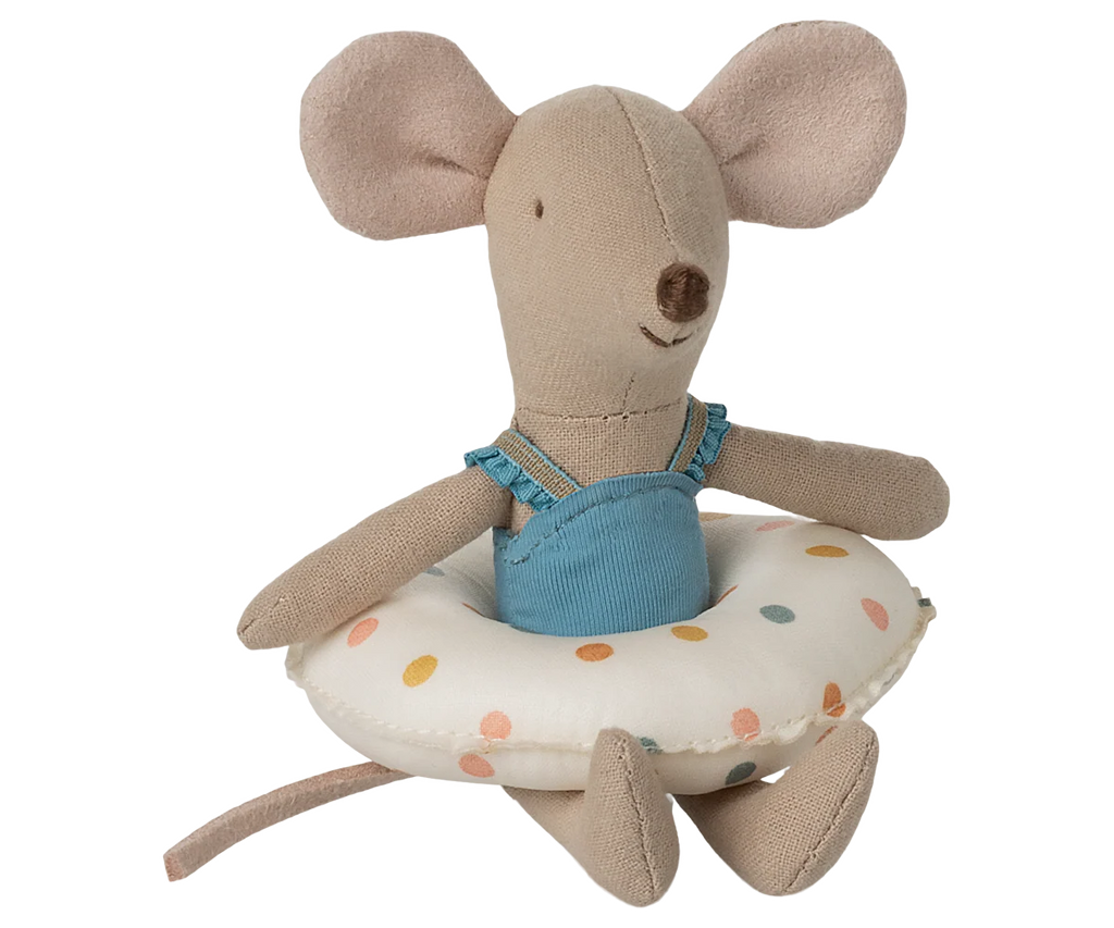 The Maileg Beach Mouse With Float, Little Sister - Multi Dot features a plush toy mouse in a blue swimsuit with big pink ears and a long tail, sitting on a white float with colorful dots for an adorable, playful look.