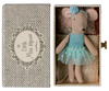 A Maileg Dance Mouse in a mint dress, Little Sister size, rests in a decorative daybed box featuring patterned sides and cozy bedding.
