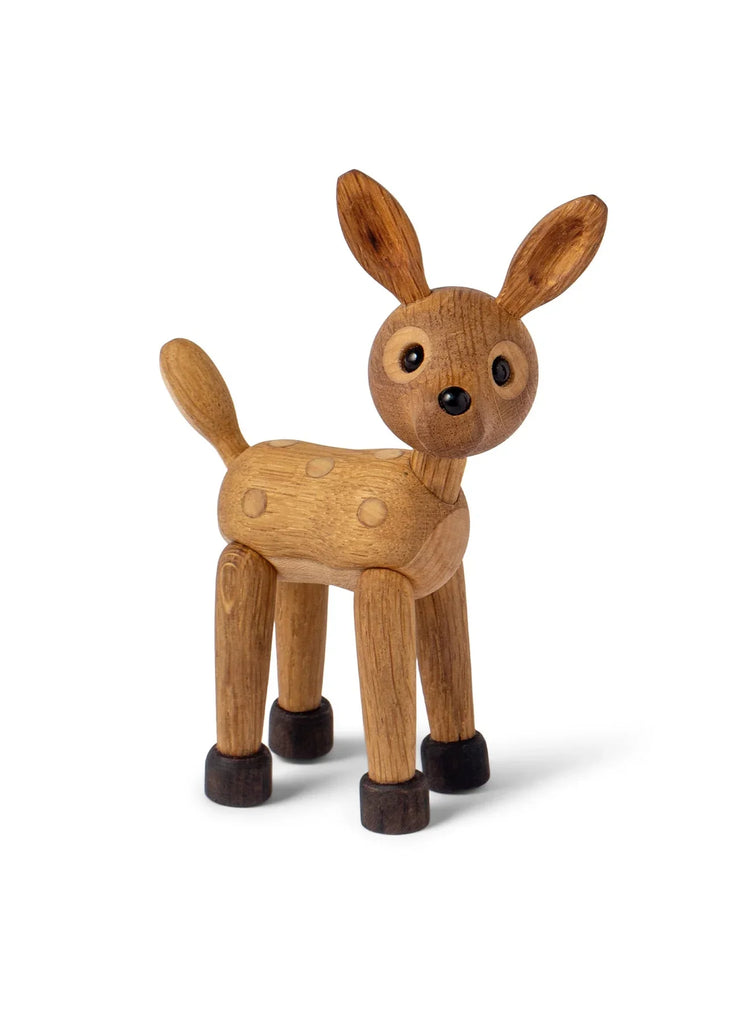 A Spring Copenhagen Spot The Fawn with large eyes, articulated limbs, and circular button-like joints, standing against a plain white background.