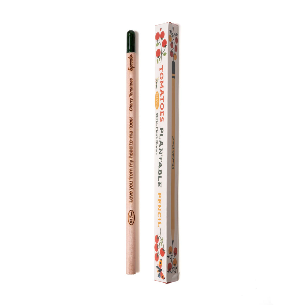 A Tomatoes Plantable Pencil – Eco-Friendly with a green tip sits next to its tomato-themed box labeled "Tomatoes Plantable Pencil," offering a sustainable gift that lets you grow cherry tomatoes when the pencil is used up.