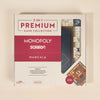 The 3-in-1 Game Collection: Monopoly, Sorry & Mancala is a premium boxed wooden board game set featuring the classic games. The box displays the Monopoly and Mancala boards and lists its features and contents on the front.