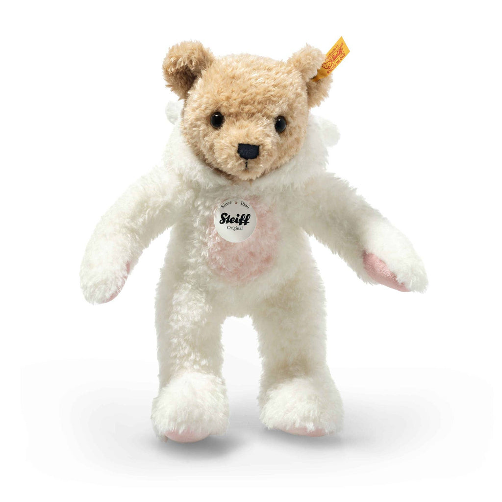 An 11-inch Steiff Teddy Bear with a bunny hoodie costume stands upright against a white background, showcasing its soft fur and classic yellow Steiff tag—a delightful collectible for any fan.