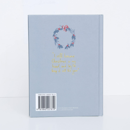 The light blue back cover of the A Christmas Carol | Collector's Edition | Hardcover Book features a wreath with a red bow and gold text: “I will honour Christmas in my heart and try to keep it all the year.” Barcode is at the bottom.
