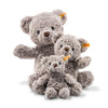 The Steiff Honey Teddy Bear Stuffed Plush, 8 inches, features soft gray textured fur, a yellow Steiff tag in its left ear, and a friendly expression—an ideal children's toy shown against a plain white background.