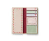 The Delphine Sticky Note Folio features a left section for large lined notes with a floral border and five pastel decorative sticky note pads on the right, all accented with the elegant Delphine pattern.