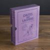 A purple "Chutes and Ladders Vintage Bookshelf Edition" box rests on a wooden table. This classic board game, for ages 3+ and 2-4 players, features simple line drawings of kids on ladders and chutes.