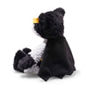 The Steiff Batman Teddy Bear, 12 Inches, sits upright with a black cape and yellow mask over its eyes, resembling the iconic superhero. The plush panda is set against a plain white background.