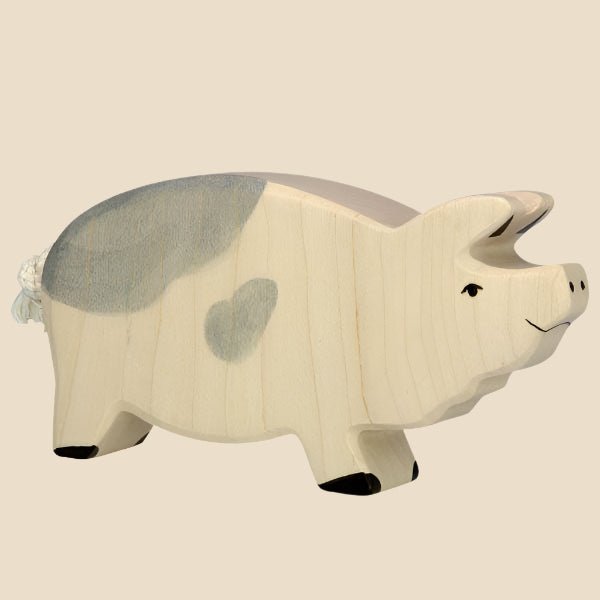 The Holtztiger Boar is a handcrafted maple and beech wood figurine, featuring a cream color with gray spots, black hooves, heart mark, white rope tail, simple friendly face, and stands on all fours. Ships in one week.