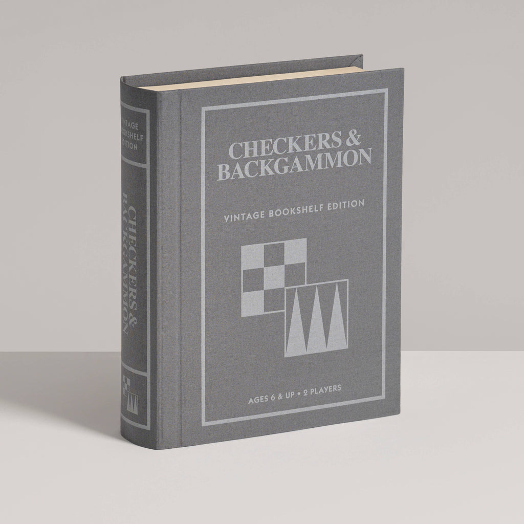 A gray hardcover Board Game: Checkers & Backgammon Vintage Bookshelf Edition stands upright on a white surface, with simple graphics that highlight the timeless appeal of these classic games.