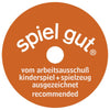 Rust-colored circular badge with white "spiel gut" text at top and "vom arbeitsausschuß kinderspiel + spielzeug ausgezeichnet recommended" below a central hole, often seen on handcrafted HOLZTIGER Squirrel, brown figure made from maple and beech wood.