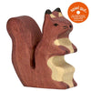 The Squirrel, brown is a handcrafted toy made from maple and beech wood, featuring an upright pose with a curled tail. An orange "spiel gut" quality recommendation badge appears in the top right corner.
