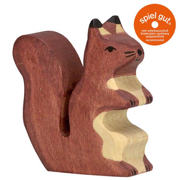 The Squirrel, brown is a handcrafted toy made from maple and beech wood, featuring an upright pose with a curled tail. An orange "spiel gut" quality recommendation badge appears in the top right corner.