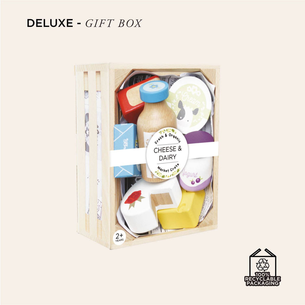 The Cheese & Dairy Wooden Market Crate is a pretend play set with wooden cheese and dairy foods in 100% recyclable packaging, labeled "Deluxe - Gift Box" and "Cheese & Dairy." Ideal educational toy for ages 2+.