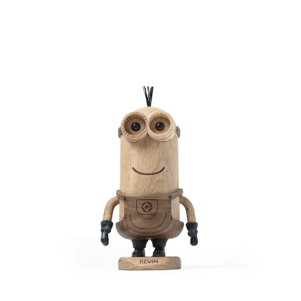 The Boyhood Minions Kevin, Small is a wooden figurine made from European FSC White Oak. Resembling a Minion with round goggles, black gloves, and tufted hair, it stands on a “Sir Kevin” base—a must-have collectible for fans.