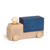 The Lubulona Wooden Truck - Blue features a natural wood cab and wheels, a round wooden driver, and a blue rectangular bed—ideal for eco-friendly toy lovers.