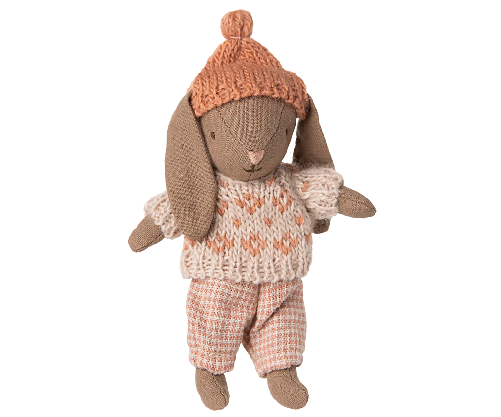 PRE-ORDER: Winter Bunny, Micro - Brown - Rose (ships early Nov) features a soft bunny in a pink knit hat, cream and pink sweater, and checkered pants—ideal for Maileg accessories or any miniature dollhouse display.