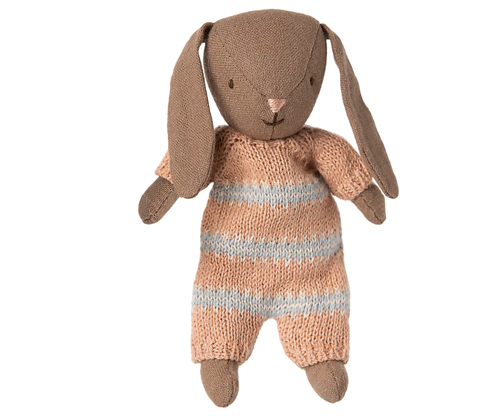 A soft brown bunny with long floppy ears, wearing a dusty rose knitted suit. Perfect for a miniature dollhouse, this micro bunny has simple stitched facial details and outstretched arms. PRE-ORDER now—estimated ship date: early October.