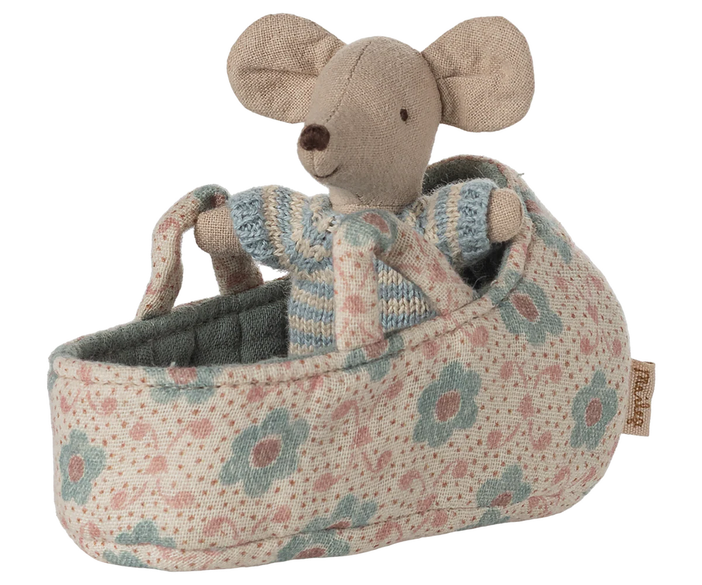 PRE-ORDER: Baby Mouse in Carry Cot - Blue features a small mouse in a blue and white knitted suit, resting in a floral-patterned carry cot with handles. Estimated ship date: late October.