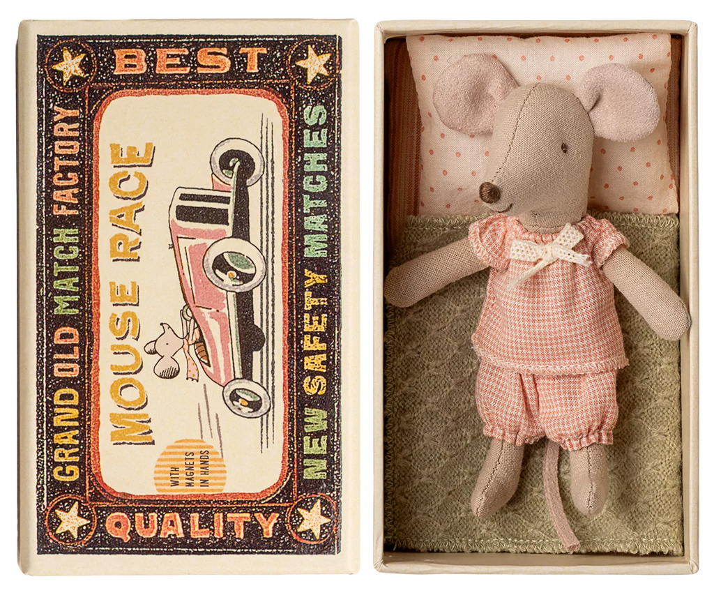 The PRE-ORDER: Little Sister Mouse in Matchbox (Aprox. Ship Date: Early November) features a Maileg mouse dressed in pink, lying in a small bed inside a matchbox with vintage-style art and “Grand Old Match Factory Mouse Race” text on the lid.