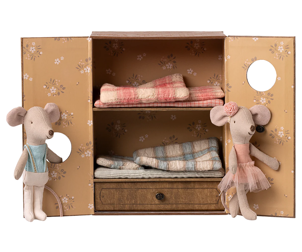 Two Ballet Mice, Little Sister in a pink dress and headband and Brother in overalls, stand by an open wardrobe with shelves and a drawer in their cozy dance studio. PRE-ORDER: Shipping late October.