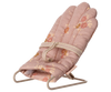 PRE-ORDER: Babysitter, My - Rose features a small, pink, floral-patterned padded chair with a fabric strap and light-colored metal frame—ideal for babysitter play with tiny rabbits or bunnies. Estimated ship date: late September.