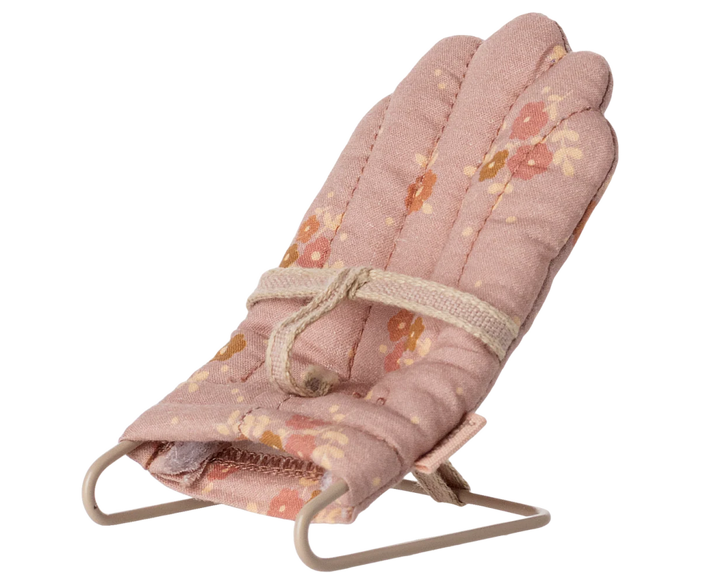 PRE-ORDER: Babysitter, My - Rose features a small, pink, floral-patterned padded chair with a fabric strap and light-colored metal frame—ideal for babysitter play with tiny rabbits or bunnies. Estimated ship date: late September.