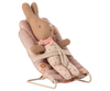 The PRE-ORDER: Babysitter, My - Rose (ships late September) features a small bunny doll with a pink bow tie strapped into a pink floral baby bouncer chair, ready to play the perfect babysitter.