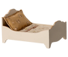 PRE-ORDER: Bed, Mouse – Off White (ships early October). This small white wooden bed for mice features floral-patterned bedding and a brown pillow, shown against a plain background.