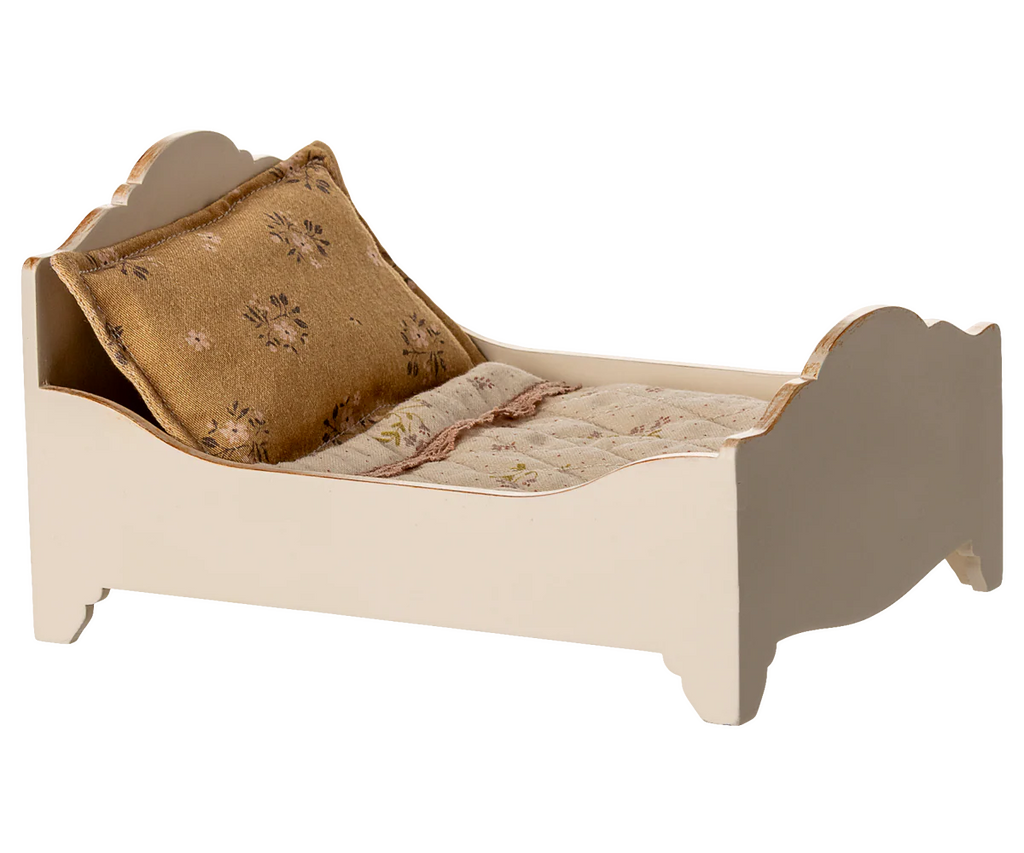 PRE-ORDER: Bed, Mouse – Off White (ships early October). This small white wooden bed for mice features floral-patterned bedding and a brown pillow, shown against a plain background.