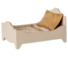 PRE-ORDER: Bed, Mouse - Off White (ships early October). A small white wooden bed with a tan floral pillow and patterned blanket—ideal for mice to sleep cozily.