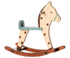 PRE-ORDER: Rocking Horse, Mouse - Spotted features a cream body with brown spots, a blue seat, and sturdy metal handles, shown in a side view against a plain background. Approximate ship date: Early September.