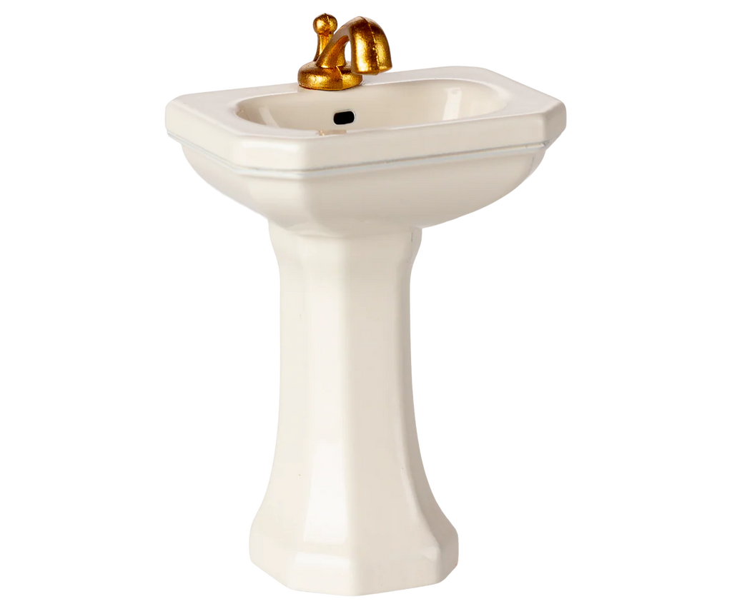 The PRE-ORDER: Bathroom Sink, Mouse Size - Off White (ships early October) features a gold faucet and handles, ideal for your SuitCasa bathroom, and is shown against a plain background.