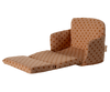 PRE-ORDER the Sofa Bed, Mouse - Dots, featuring light brown fabric with orange polka dots. This miniature recliner has an extended footrest and padded armrests—perfect for a cozy SuitCasa living room. Estimated ship date: Late September.