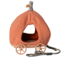 The PRE-ORDER: Maileg Pumpkin Carriage, Mouse (ships early October) is a pumpkin-shaped pet carrier featuring a fabric exterior, wicker base, small window, decorative wheels, and leaf-patterned leash—ideal for fairytale travel.