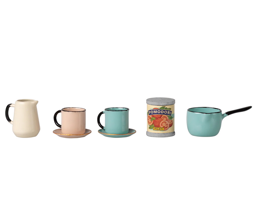 A PRE-ORDER: Maileg Kitchen Counter, Mouse (Approx. Ship Date: November) is shown with a cream pitcher, pastel mugs and saucers, a Pomodori tomato can, and a turquoise saucepan arranged on its small surface against a neutral background.