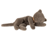 The PRE-ORDER: Sleeping Kitten Plush, Medium - Grey (Estimated Ship Date: Late November) is a soft, fuzzy plush made from recycled polyester. It lies on its side with closed eyes, a long tail, and wears a small brown ribbon around its neck.