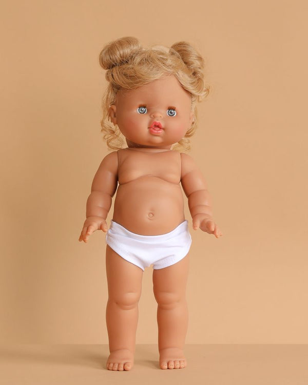 The Minikane Standing Doll (14") - Louisa features blonde hair, blue eyes, and styled hair. Louisa stands upright against a beige background wearing only white underwear; clothing is sold separately.