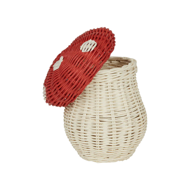 Olli Ella Mushroom Basket With Coloring Pencils- Red: A woodland-inspired wicker basket with a red, white-spotted mushroom lid, partially open to show the beige woven base. Perfect for adding charm or storing included coloring pencils.