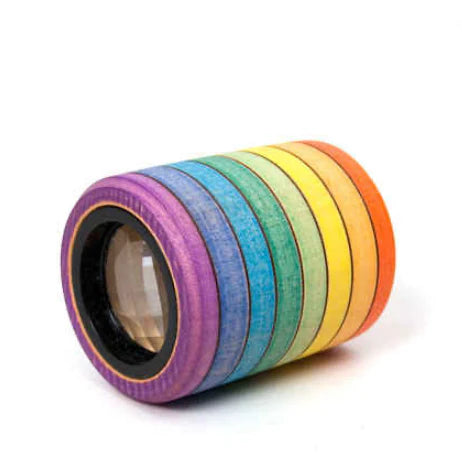 The Mader Rainbow Kaleidoscope features round, wooden rings in vibrant colors stacked around a central kaleidoscope lens, all showcased on a white background.
