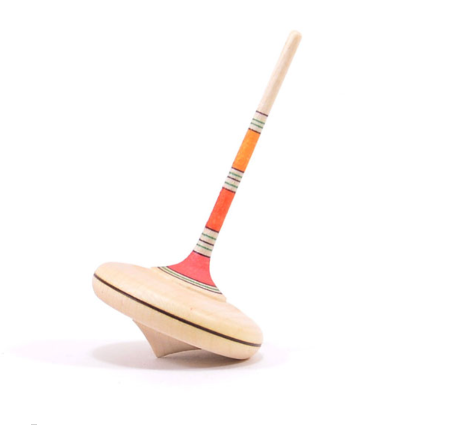 The Mader Spaghetti Spinning Top - Orange, featuring a tall handle and vibrant orange, red, and green stripes on maple wood, stands upright against a white background.