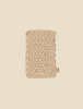 A rectangular woven natural fiber scrubber with a braided pattern from the Maileg Little Bother Bathroom Set, ideal as Maileg bathroom accessories, shown against a plain beige background.