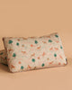 The Maileg Cushion - Unicorn is a rectangular, soft cotton cushion featuring whimsical unicorns, green trees, and colorful rainbows on cream fabric with a solid pale peach back.