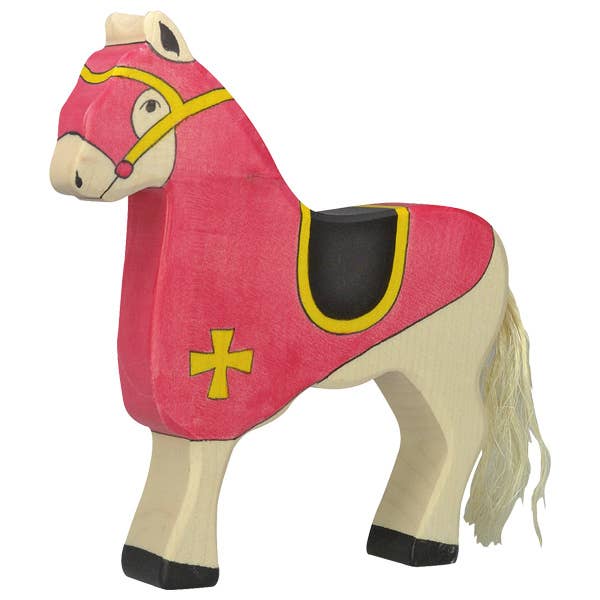 The Holztiger Tournament Horse, Red features a cream body, black hooves, white mane and tail, red and yellow saddle blanket, and yellow bridle with cross. Handcrafted in Europe and part of the cherished HOLZTIGER figures collection. Ships in one week.