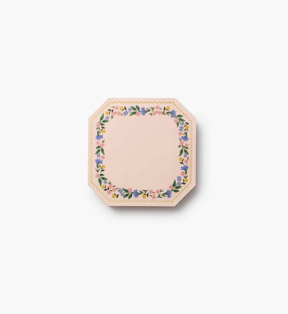 The Gemma Mini Notepad Trio features pastel octagonal covers with scalloped edges, metallic gold accents, and a border of small pink, blue, and green floral designs. The center is plain and the trio is displayed against a white background.