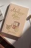 A beige "Northanger Abbey | Collector's Edition | Hardcover" with a vintage carriage illustration rests on a sunlit white surface.