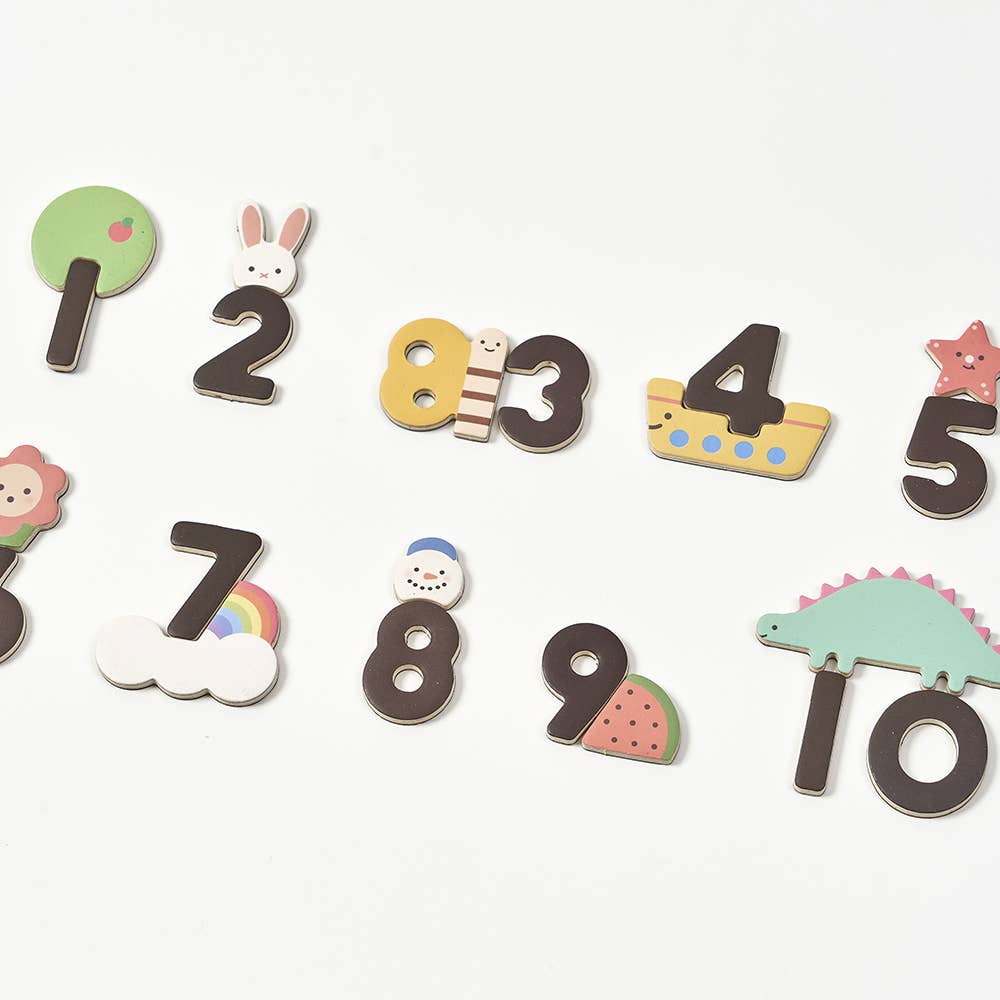 The Magnetic Number Play Set includes ten colorful magnetic numbers with cute cartoon designs like a lion, rainbow, and dinosaur. Pair this set with wooden toys or alphabet cards for an engaging way to make learning fun.