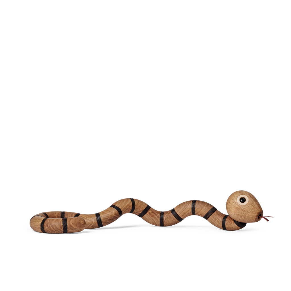 Spring Copenhagen The Snake, featuring brown and black stripes, a red tongue, and a painted eye, rests on a black background—perfect for those seeking a unique spiritual gift inspired by the Chinese zodiac snake.